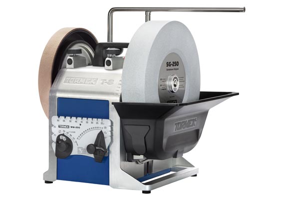 The Tormek T-8 sharpening system with a grindstone and a leather honing wheel.  