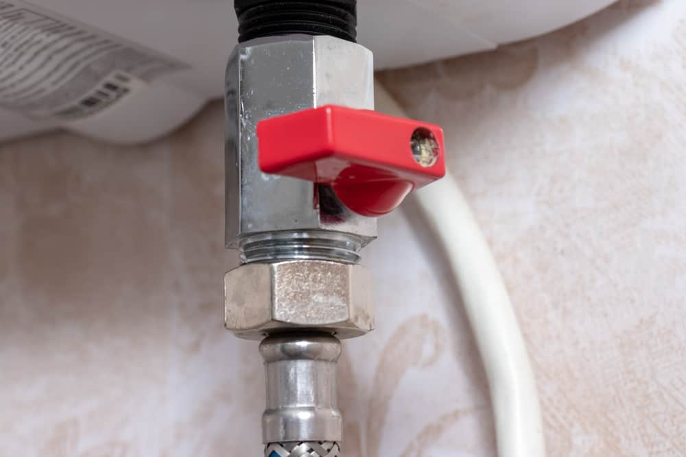 Open the water heater shut-off valve