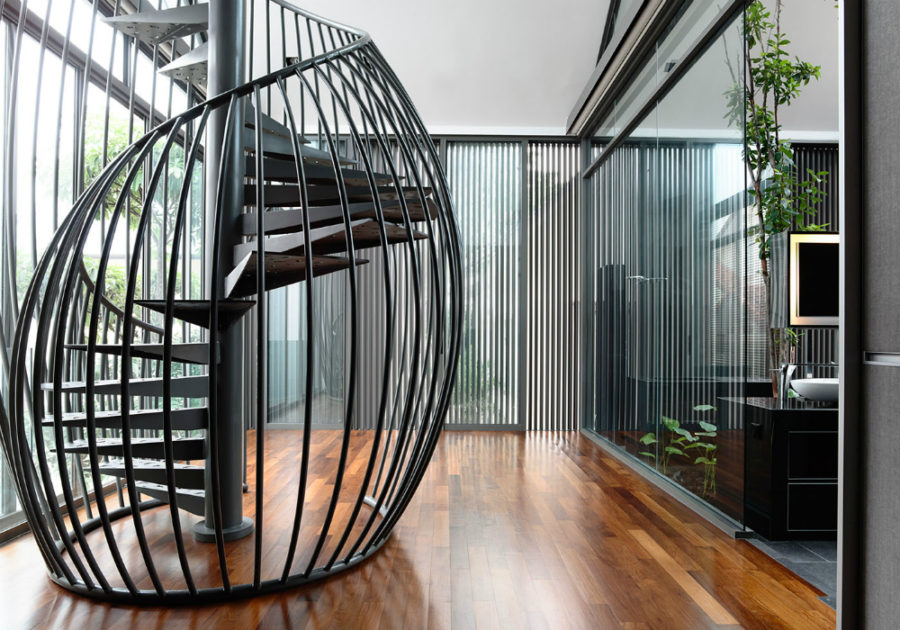 Spiral stairs with metal railing